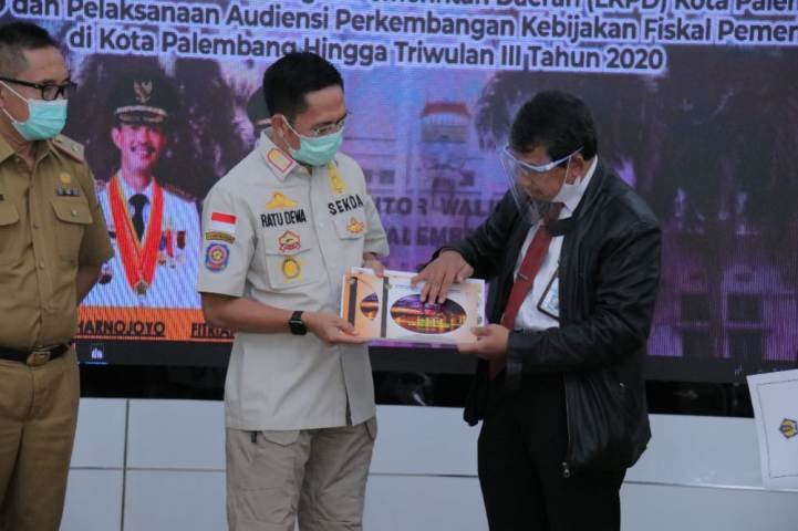 kerja keras , Opini Wajar Tanpa Pengecualian , penetapan MoU , pengelolaan Akutansi Sistem Keuangan Daerah , pertukaran informasi