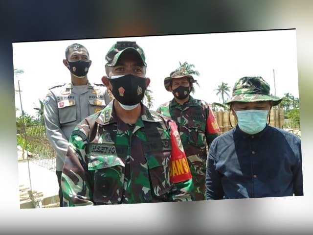 pembuatan jalan sepanjang 750 meter , pembuatan MCK