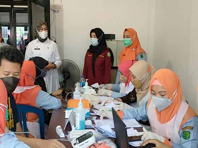 Mengikuti Tes Swab , target herd imunity masyarakat , vaksinasi massal