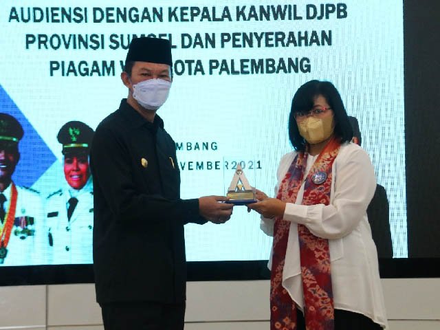 laporan keuangan , masalah rekomendasi aset , Opini Wajar Tanpa Pengecualian , Piagam Penghargaan