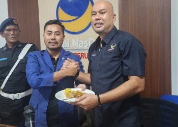 Potong Tumpeng HUT ke-15, Garda Pemuda NasDem Sumsel Matangkan Persiapan Menuju Kongres II di Jakarta