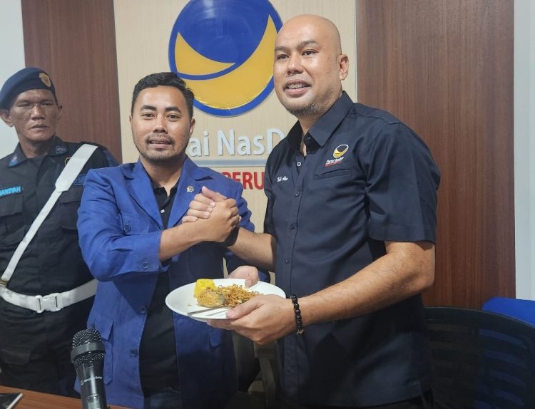 Potong Tumpeng HUT ke-15, Garda Pemuda NasDem Sumsel Matangkan Persiapan Menuju Kongres II di Jakarta