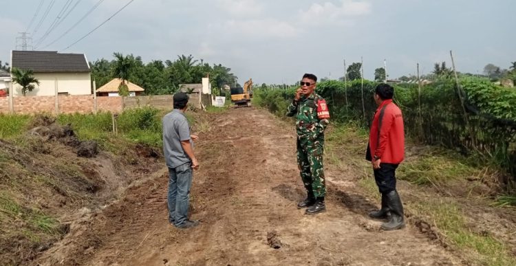 Sepanjang 750 Meter Jalan Dibangun dalam Program TMMD ke-129 Kodim 0418/Palembang di Talang Jambe