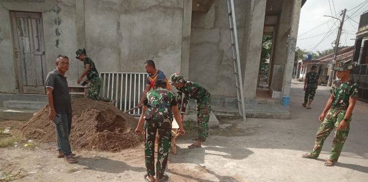 Progres Pembangunan Pos Keamanan Mushola Baitul Maksurin Terus Dikebut Satgas TMMD ke-129 Kodim 0418/Palembang