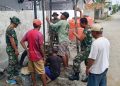 Memasuki Hari Ketujuh, Satgas TMMD Ke-129 Kodim 0418/Palembang Lanjutkan Pembuatan Sumur Bor Rumah Tahfidz Quran