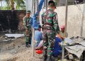 Hari Ke-12 TMMD Kodim 0418/Palembang, Tiga Personil TNI Pastikan Air Sumur Bor di Rumah Tahfiz Al Fatihah Layak Digunakan