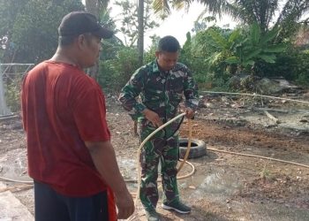 Hari Ke-13 TMMD Kodim 0418/Palembang, Prajurit TMMD Hadirkan Harapan Lewat Air Bersih untuk Warga Talang Jambe