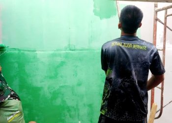 Memasuki Hari ke -18 Satgas TMMD ke-129 Kodim 0418/Palembang Lanjutkan Pengecatan RTLH Milik Ibu Sriyanti