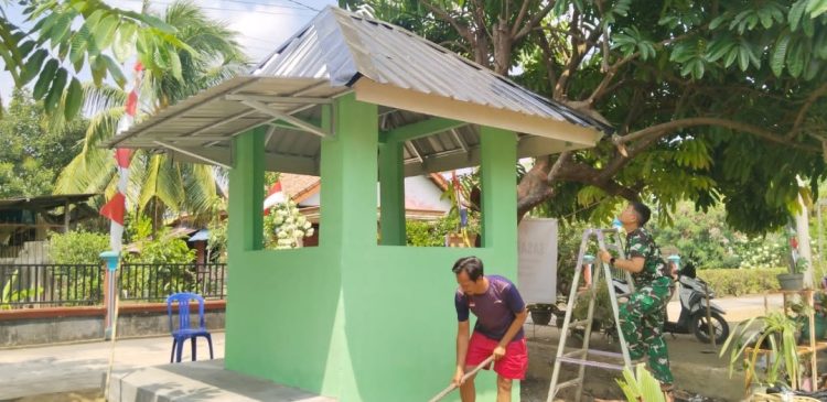 Satgas TMMD ke-129 Kodim 0418/Palembang Selesaikan Pengecatan dan Pembersihan Pos Kamling di Talang Jambe