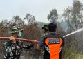 Aksi Gerak Cepat Personel Lanud Smh Padamkan Api di Talang Keramat Banyuasin